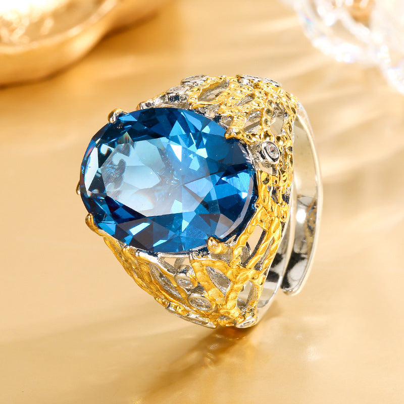 Copper Bottom Gold-plated Simulated Blue Spinel Egg-shaped Hollow Ring Main Stone